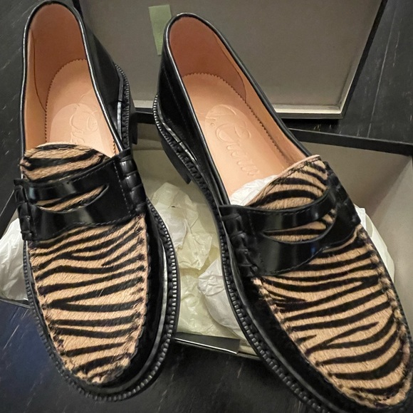 Black with zebra strip front loafers. Have never been worn. - Picture 2 of 2